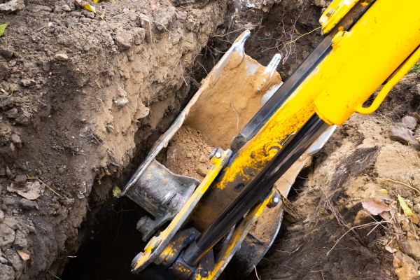 Downspout Trenching in Milton